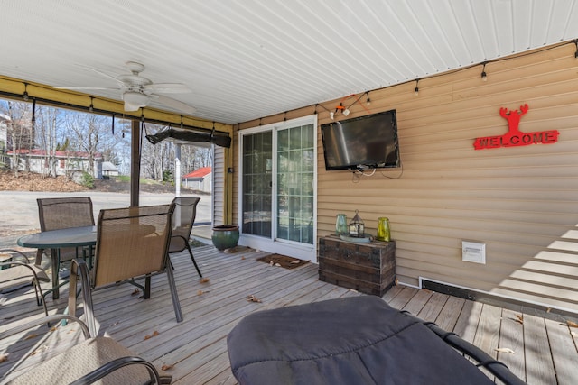 214 Gore Rd, Naples, ME 04055 - wooden deck with a ceiling fan and outdoor dining area
