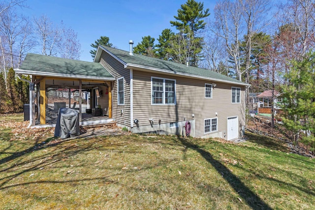 214 Gore Rd, Naples, ME 04055 - rear view of house with a yard