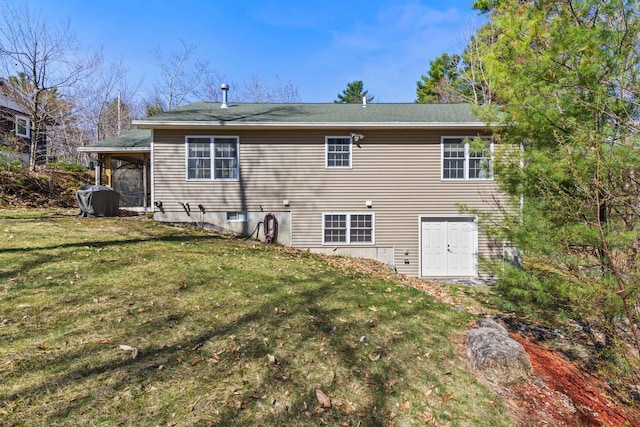 214 Gore Rd, Naples, ME 04055 - rear view of house with a lawn