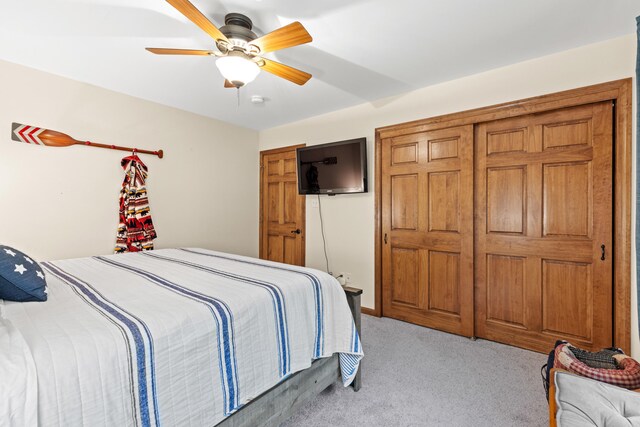 214 Gore Rd, Naples, ME 04055 - bedroom featuring light carpet and ceiling fan