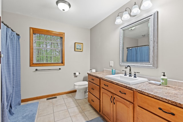 214 Gore Rd, Naples, ME 04055 - bathroom with vanity, toilet, tile patterned floors, baseboards, and a shower with shower curtain