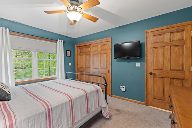 214 Gore Rd, Naples, ME 04055 - carpeted bedroom featuring baseboards and ceiling fan