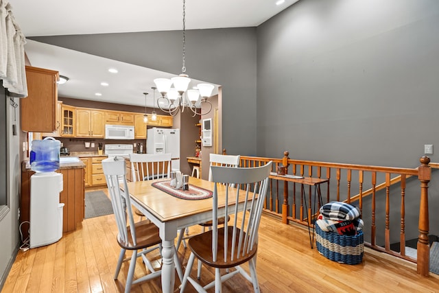 214 Gore Rd, Naples, ME 04055 - dining space with a chandelier, light wood-style flooring, recessed lighting, and high vaulted ceiling