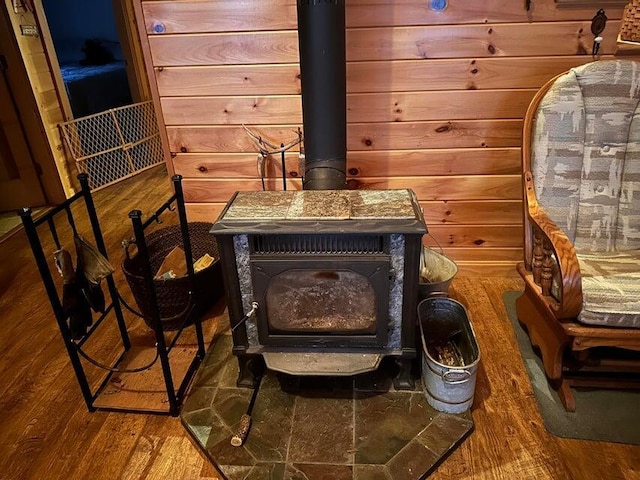 200 Averill Hill Rd, Dixfield, ME 04224 - detailed view of a wood stove, wood finished floors, and wood walls