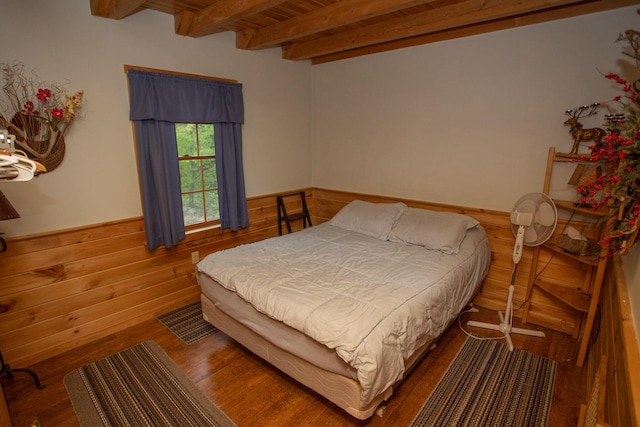 200 Averill Hill Rd, Dixfield, ME 04224 - bedroom featuring wood walls, wood finished floors, wainscoting, and wooden ceiling with exposed beams