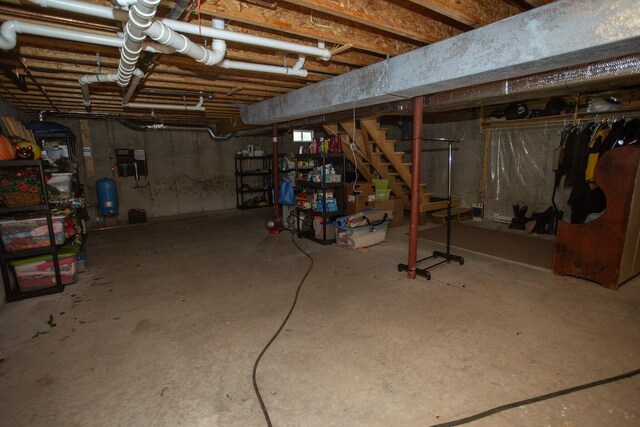 200 Averill Hill Rd, Dixfield, ME 04224 - unfinished below grade area with a water pressure tank and stairway