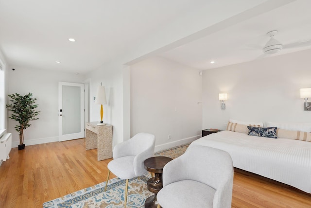 bedroom featuring light wood-style flooring, baseboards, and recessed lighting