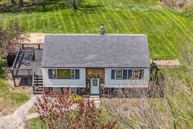 269 Hebron Rd, Buckfield, ME 04220 - bi-level home with roof with shingles, a deck, stairs, and a chimney