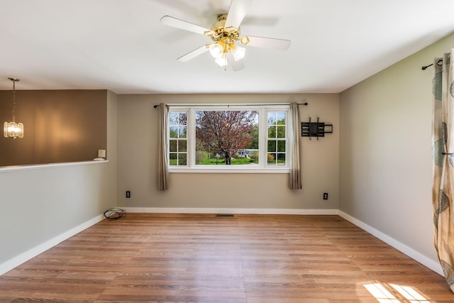 269 Hebron Rd, Buckfield, ME 04220 - empty room featuring wood finished floors, ceiling fan, and baseboards