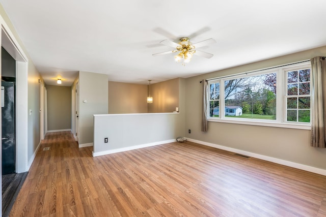 269 Hebron Rd, Buckfield, ME 04220 - unfurnished room with light wood-style flooring, baseboards, and a ceiling fan