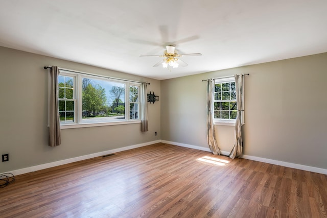 269 Hebron Rd, Buckfield, ME 04220 - unfurnished room featuring a ceiling fan, wood finished floors, and baseboards