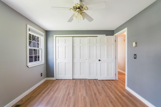 269 Hebron Rd, Buckfield, ME 04220 - unfurnished bedroom with wood finished floors, baseboards, and a closet