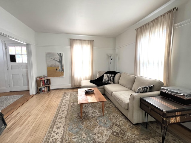 60 Elm St, Bangor, ME 04401 - living area with plenty of natural light and wood finished floors
