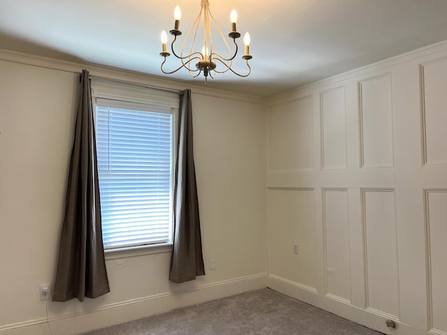 60 Elm St, Bangor, ME 04401 - carpeted empty room with a chandelier