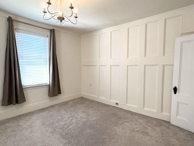 60 Elm St, Bangor, ME 04401 - spare room featuring carpet flooring and a chandelier