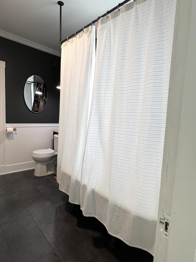 60 Elm St, Bangor, ME 04401 - bathroom with crown molding, a wainscoted wall, and toilet