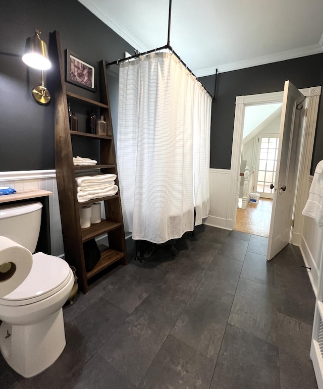 60 Elm St, Bangor, ME 04401 - full bathroom featuring ornamental molding, wainscoting, toilet, and shower / bath combo with shower curtain