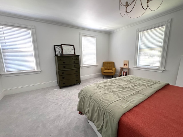 60 Elm St, Bangor, ME 04401 - bedroom with crown molding, multiple windows, carpet, a chandelier, and baseboards