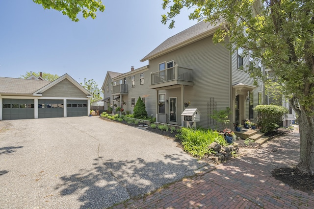 15 Obrion St Unit A, Portland, ME 04101 - view of front of property with a balcony and a garage