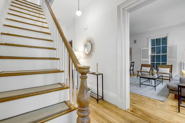 15 Obrion St Unit A, Portland, ME 04101 - stairs featuring wood finished floors and baseboards