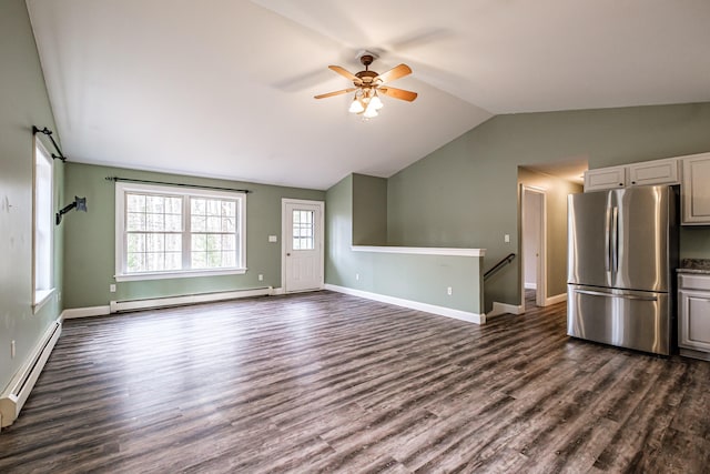 unfurnished living room with a baseboard radiator, lofted ceiling, a ceiling fan, and dark wood-type flooring
