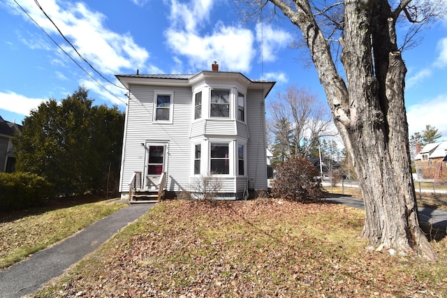 131 George St, Pittsfield, ME 04967 - italianate-style house featuring a chimney
