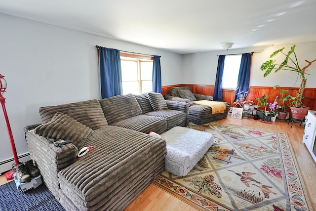 845 Hudson Rd, Glenburn, ME 04401 - living area featuring wainscoting, wood finished floors, and wood walls