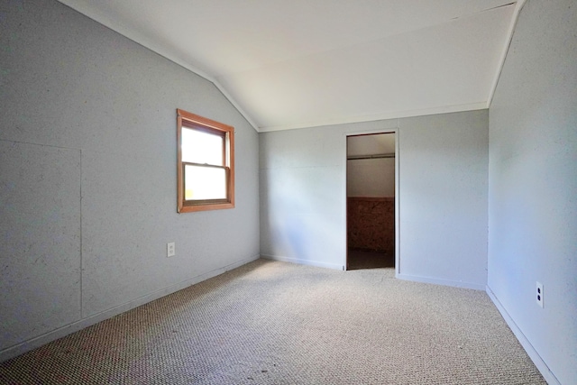 845 Hudson Rd, Glenburn, ME 04401 - unfurnished bedroom featuring lofted ceiling, carpet, and a closet
