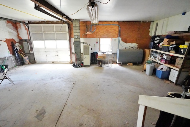 845 Hudson Rd, Glenburn, ME 04401 - garage with oil tank and electric panel