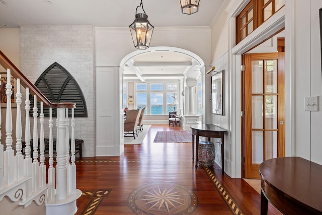 56 Deans Way, Cumberland, ME 04110 - entrance foyer with coffered ceiling, beam ceiling, arched walkways, and wood finished floors