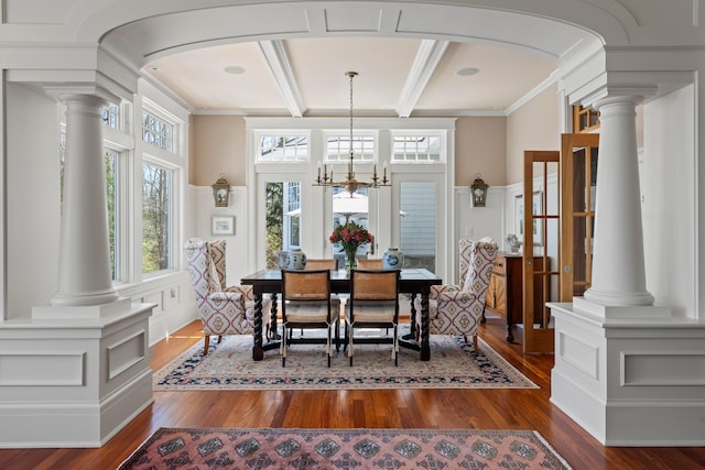 56 Deans Way, Cumberland, ME 04110 - dining space with beam ceiling, wood finished floors, ornate columns, and arched walkways