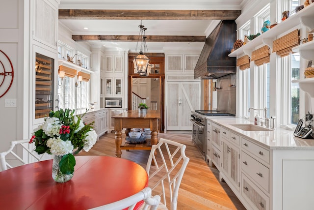 56 Deans Way, Cumberland, ME 04110 - kitchen with a sink, premium range hood, stainless steel appliances, beam ceiling, and open shelves