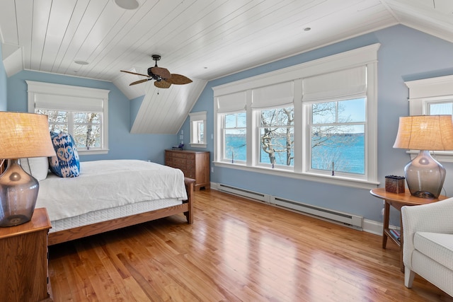 56 Deans Way, Cumberland, ME 04110 - bedroom with baseboard heating, wood finished floors, ceiling fan, and vaulted ceiling