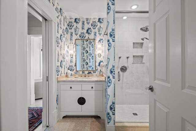 56 Deans Way, Cumberland, ME 04110 - full bathroom with vanity, tile patterned floors, and a tile shower