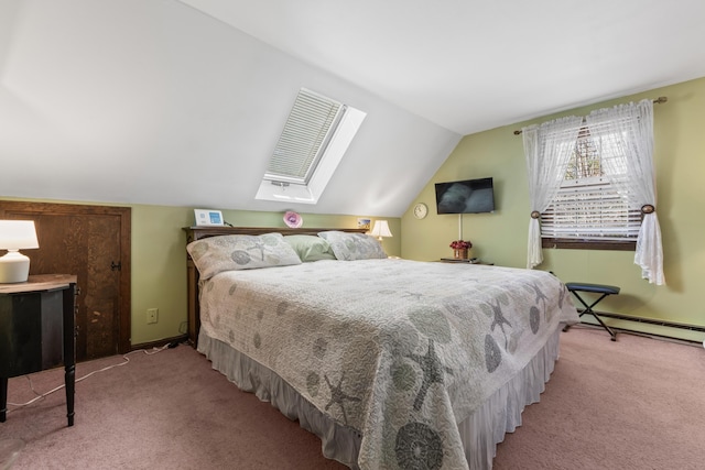 carpeted bedroom featuring baseboards, lofted ceiling with skylight, and baseboard heating