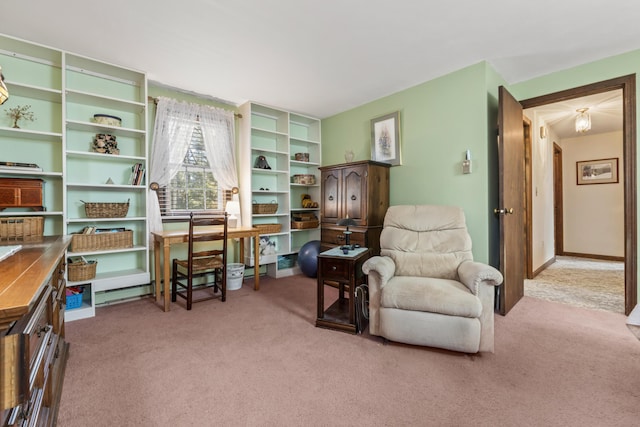 living area featuring carpet flooring