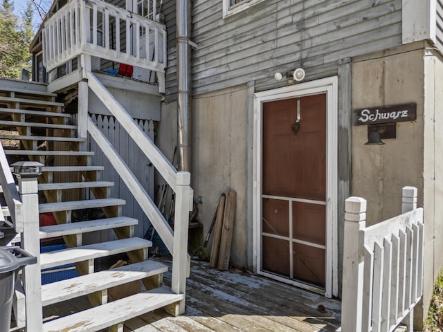doorway to property with a wooden deck
