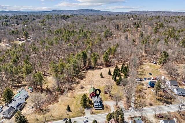 aerial view featuring a forest view