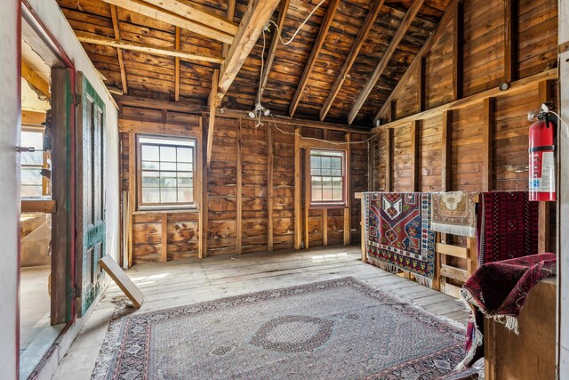 miscellaneous room featuring wooden ceiling and vaulted ceiling