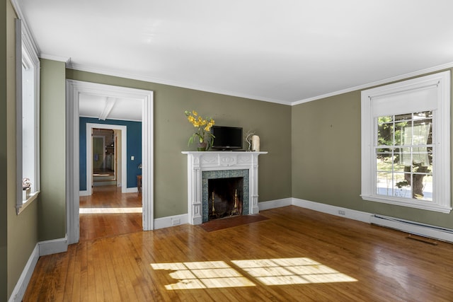40 Mountain St, Camden, ME 04843 - unfurnished living room featuring wood-type flooring, a fireplace with flush hearth, crown molding, and baseboards