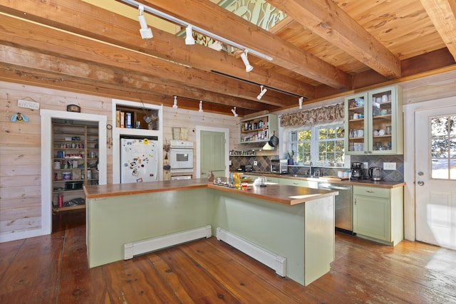 40 Mountain St, Camden, ME 04843 - kitchen featuring stainless steel dishwasher, green cabinetry, dark wood-type flooring, and freestanding refrigerator