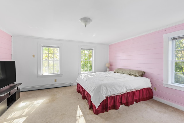 40 Mountain St, Camden, ME 04843 - bedroom with a baseboard radiator, wooden walls, carpet floors, and ornamental molding