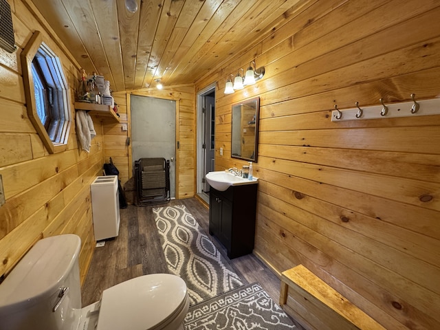 448 N Rd, Medford, ME 04463 - bathroom featuring wood finished floors, wood walls, wood ceiling, and toilet