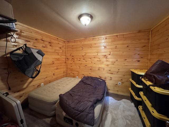 448 N Rd, Medford, ME 04463 - bedroom with wood finished floors and wood walls