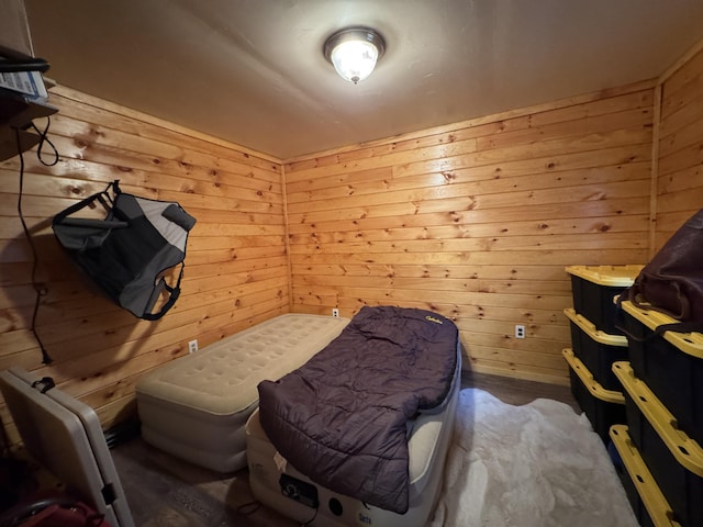 448 N Rd, Medford, ME 04463 - bedroom featuring wooden walls, wood finished floors, and a sauna