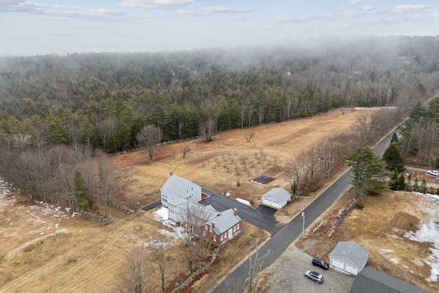 bird's eye view featuring a view of trees