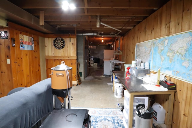 below grade area featuring wood walls