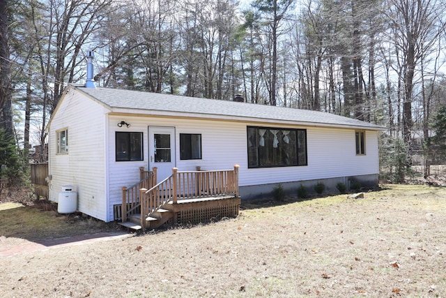 view of front of home with roof with shingles