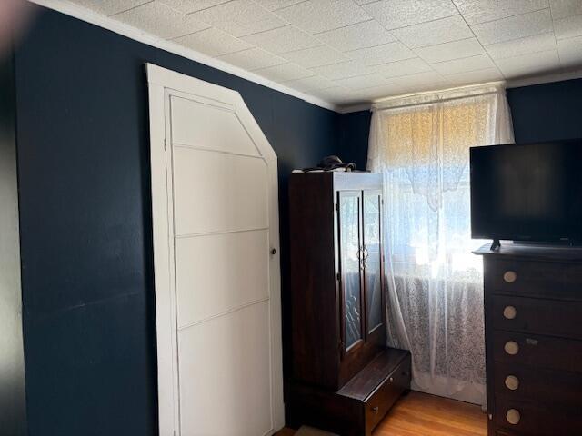 49 Pequawket Trl, Baldwin, ME 04024 - bedroom featuring wood finished floors and crown molding