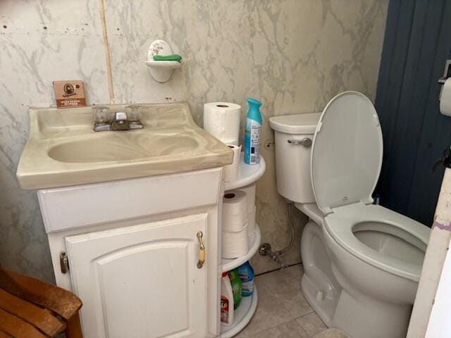 49 Pequawket Trl, Baldwin, ME 04024 - bathroom with tile patterned floors, vanity, and toilet